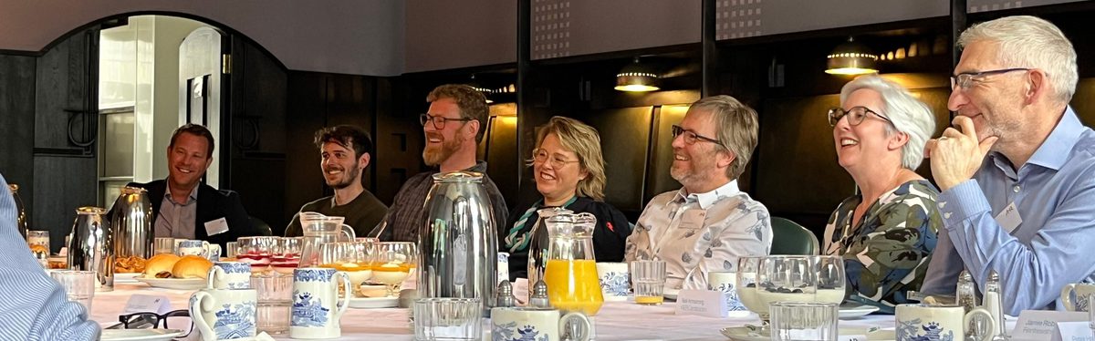 Industry professionals exploring net zero strategies and sustainable construction at the Glasgow decarbonisation roundtable.