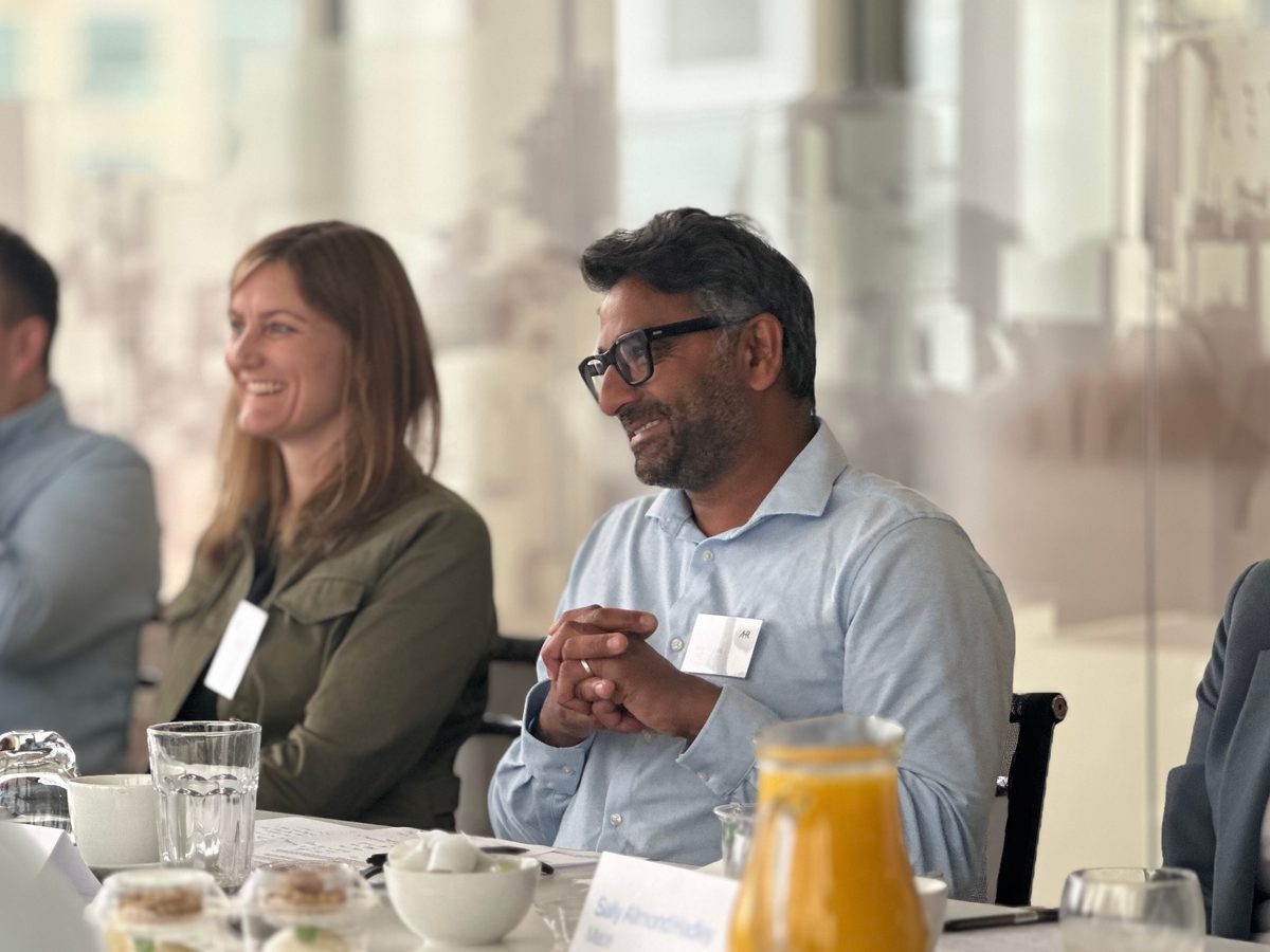 Participants sharing insights on circular economy and smarter energy use at the Manchester decarbonisation roundtable.