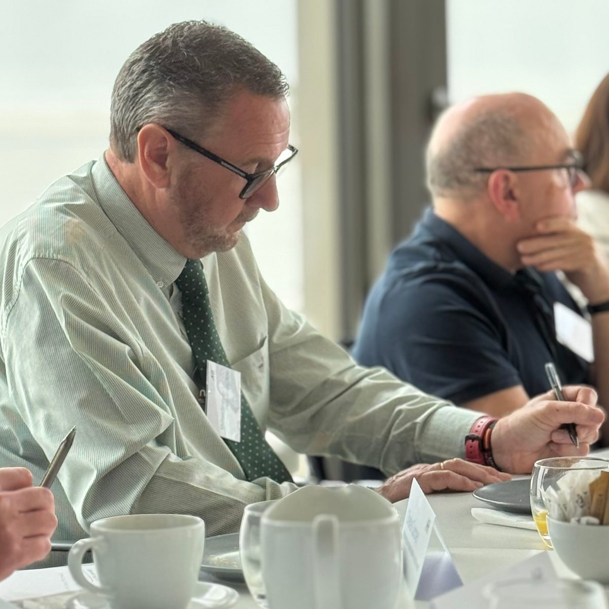 A candid of an attendee at the AHR decarbonisation roundtable event in the Manchester office.