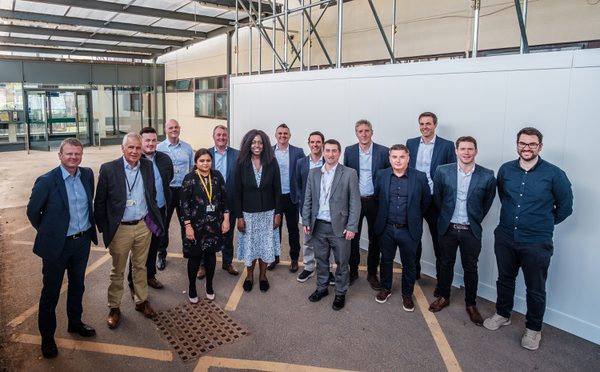 A group photo of the smiling project design team selected to reimagine Airedale General Hospital.