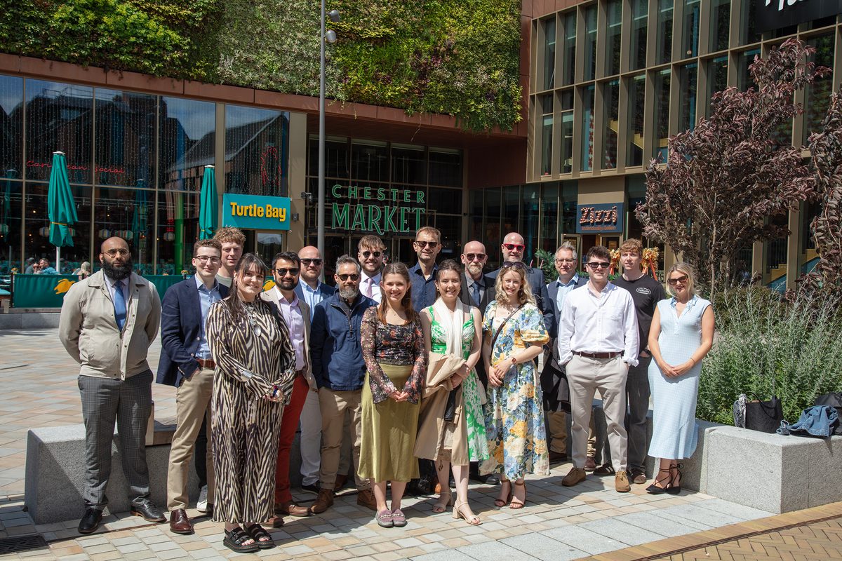 The AHR Midlands team stood smiling in a group at Chester Northgate as part of their summer away day.