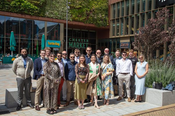 The AHR Midlands team stood smiling in a group at Chester Northgate as part of their summer away day.