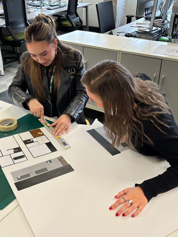 Architect Lynsey with work experience student in the Glasgow office.