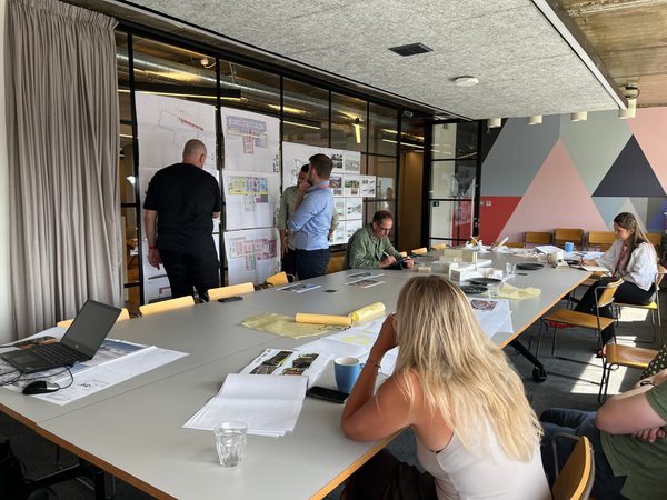 AHR colleagues working together in AHR collaborative space in the Birmingham office