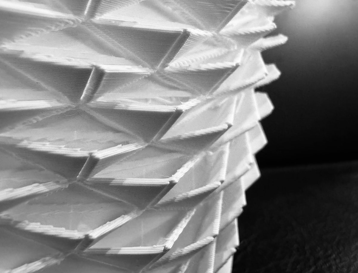 A detailed view of a 3d-printed model of a proposed healthcare facility created by a work experience student.