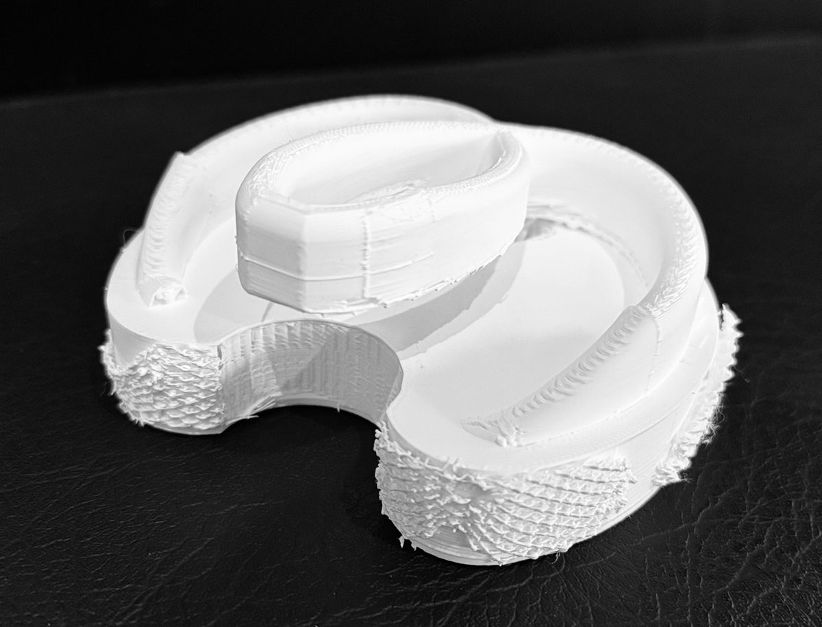 A detailed shot of a 3d-printed model of a proposed healthcare facility.