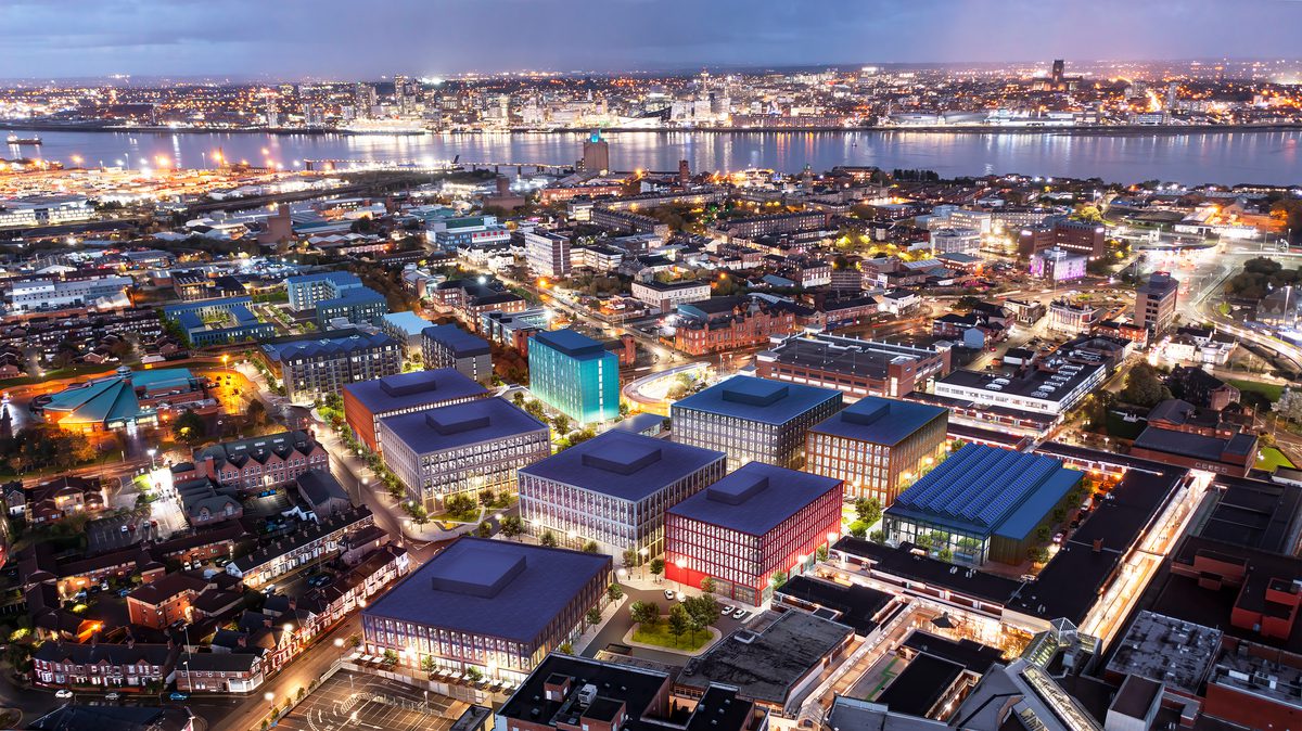 An aerial visualisation showing the scale of the complete Birkenhead Commercial District masterplan and its city centre location at night.