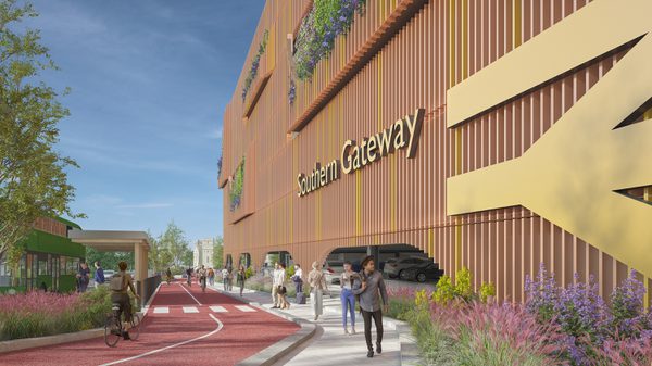 An exterior visualisation of a cycle lane at Bristol Temple Meads Southern Gateway with the car park and people walking around on a sunny day.