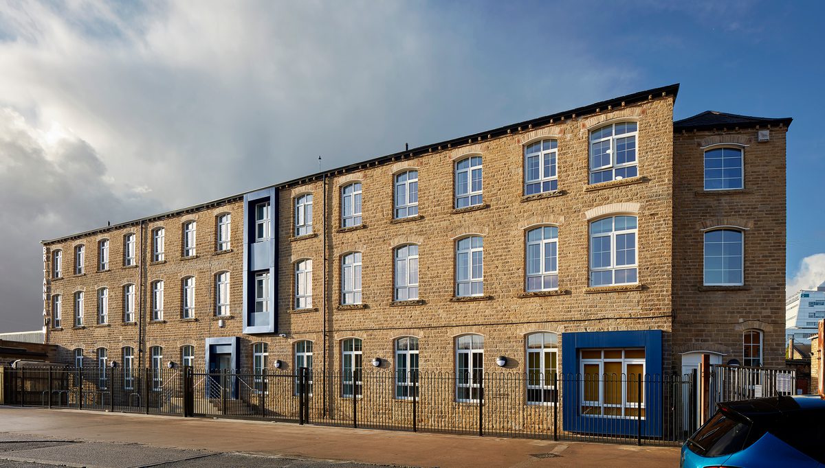 An exterior shot of the refurbished industrial mill building into student accommodation at Britannia Mills.