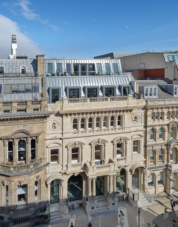 The Chatwin Building showing Victorian facade with contemporary rooftop extension and surrounding context.