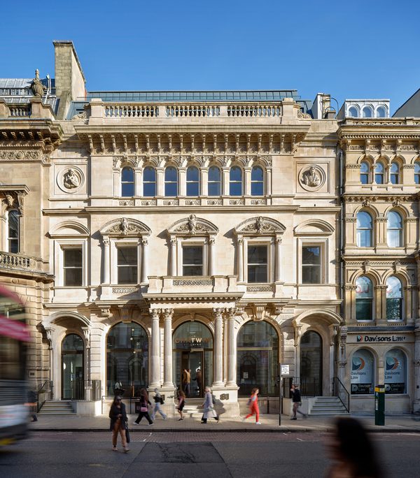 Exterior view of the reimagined Grade II listed Chatwin Building facade, showing preserved Corinthian columns and cornices.