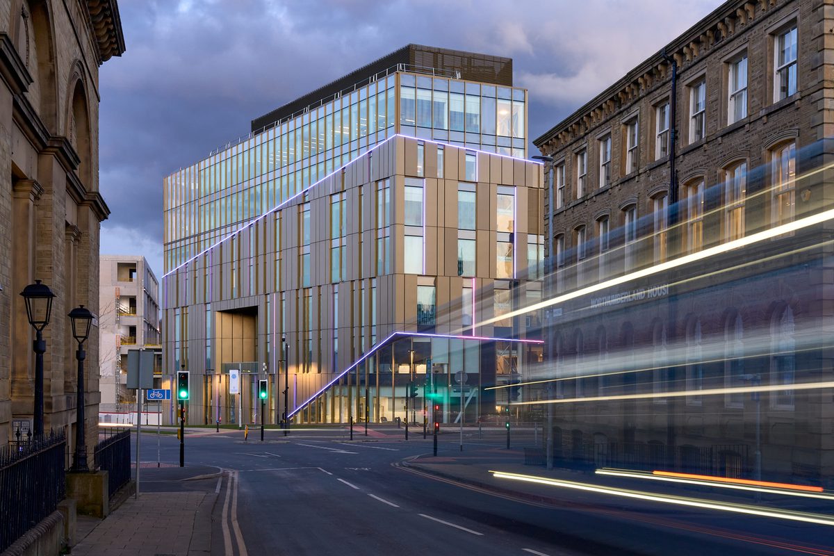 Northumberland Street elevation at dusk highlighting the Daphne Steele Building in its urban context.