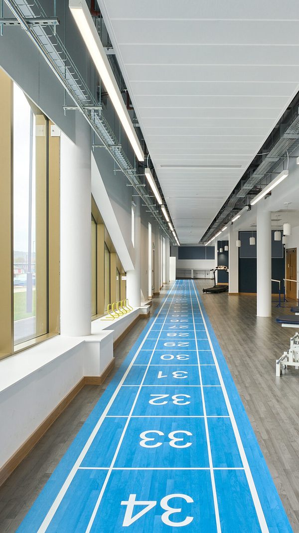 A long shot of the gait lab inside the Daphne Steele Building with equipment in the background.