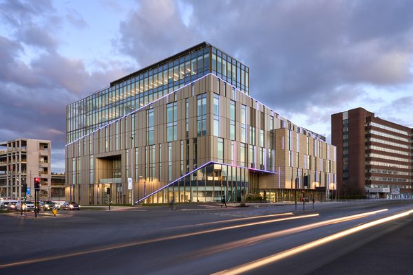 The modern exterior of the Daphne Steele building at the university of Huddersfield with extensive glazing and modern lighting solutions, situated in its city centre location.
