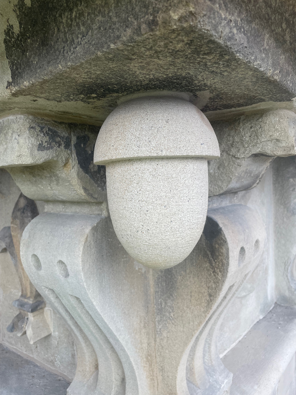A restored decorative stone feature of the grade II listed George Hotel.