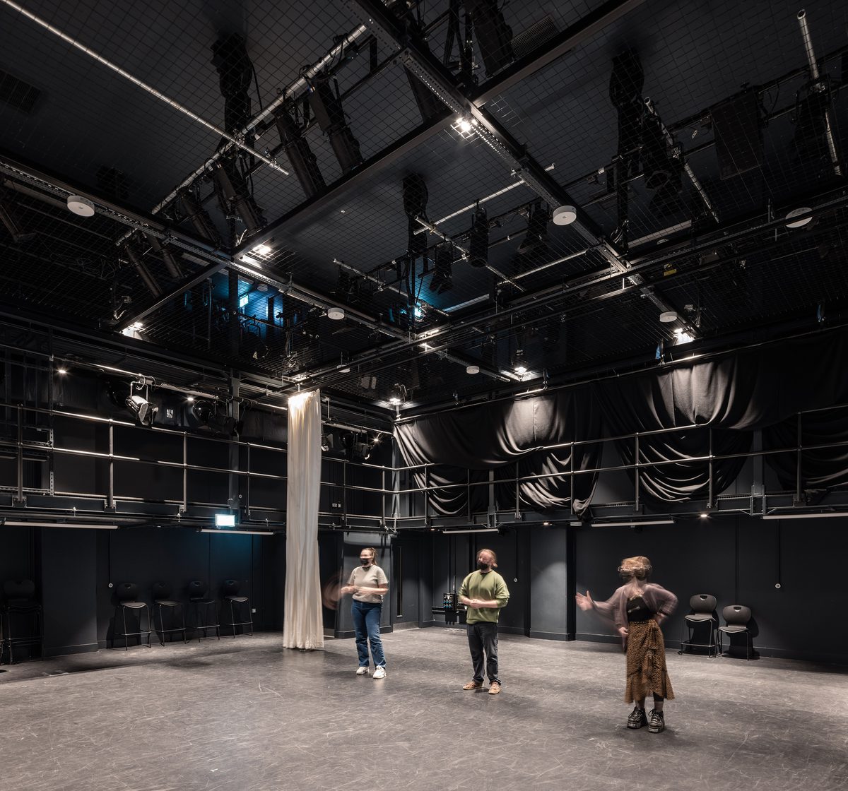 East Quad Building black box, with dedicated double height space showing lighting and other AV controls above performers heads.