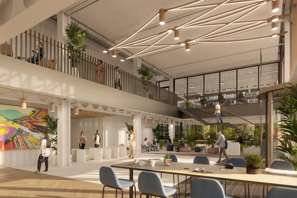 A visualisation of the internal entrance into the office building, with planting, artwork and comfortable seating in the foreground.