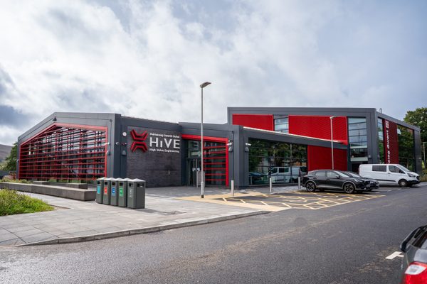 The exterior of HiVE (High Value Engineering Facility) in its entirety, showing the scale of the development and surrounding carpark.