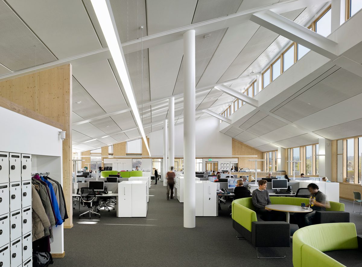 The varied workspaces in the council offices within Keynsham Civic Centre and One-Stop-Shop, with gabled ceiling above.