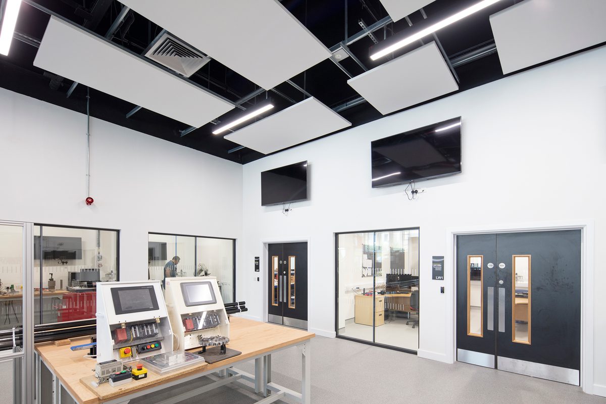 A large, open state of the art facility within the Laura Annie Wilson Building, with technical, specialist engineering equipment and windows to technical workshops.