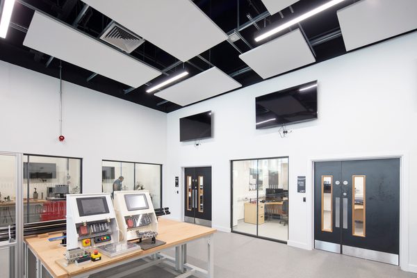 A large, open state of the art facility within the Laura Annie Wilson Building, with technical, specialist engineering equipment and windows to technical workshops.