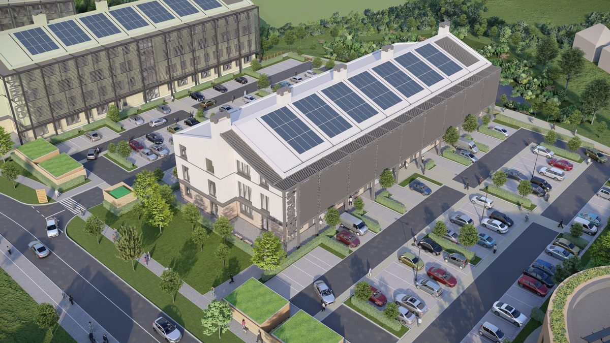 An aerial external visualisation of the Malvern technology park, showing the entirety of the development, with photovoltaic panels on the rooves and associated car parking.