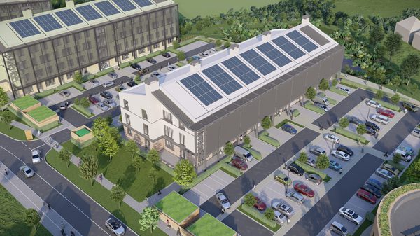 An aerial external visualisation of the Malvern technology park, showing the entirety of the development, with photovoltaic panels on the rooves and associated car parking.