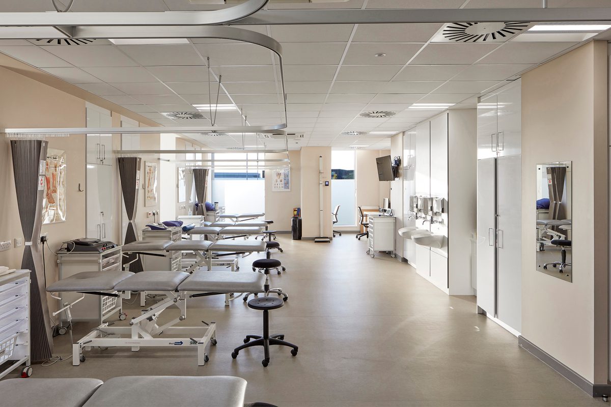 One of the physiotherapy clinics within the Manchester Institute of Health and Performance, with specialist equipment and beds, in a ward setup.