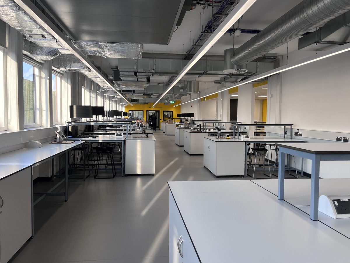 The state of the art interior of the newly refurbished Robert Blackburn Laboratory, with specialist engineering equipment and large external windows along one side of the room.