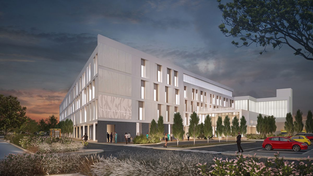 Visualisation showing the front exterior of complete Shrewsbury and Telford Hospital at night, with white frontage, planting and ample parking in front.