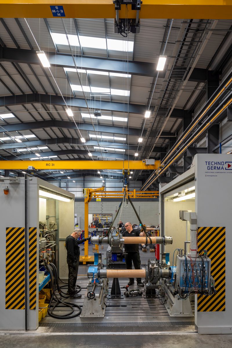 The interior of Siemens Components Facility, with staff using motor manufacturing facilities.