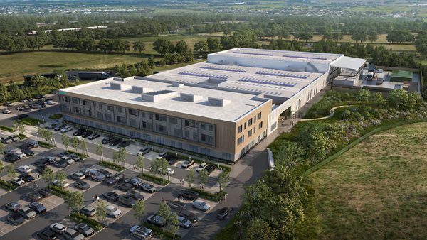 An external, aerial visualisation of Siemens manufacturing facility showing the scale of the building, associated car parking and rural surroundings.