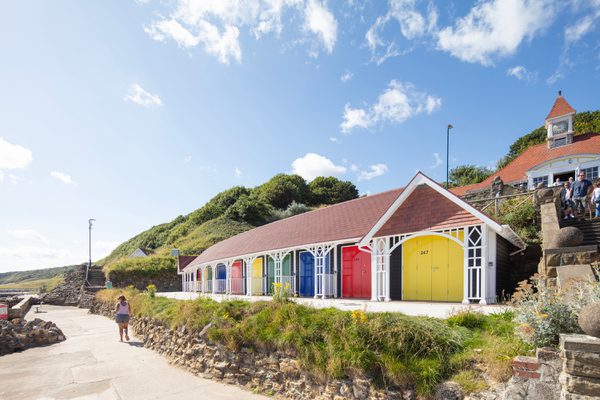 A row of rebuilt colourful beach chalets on Scarborough's South Cliff.