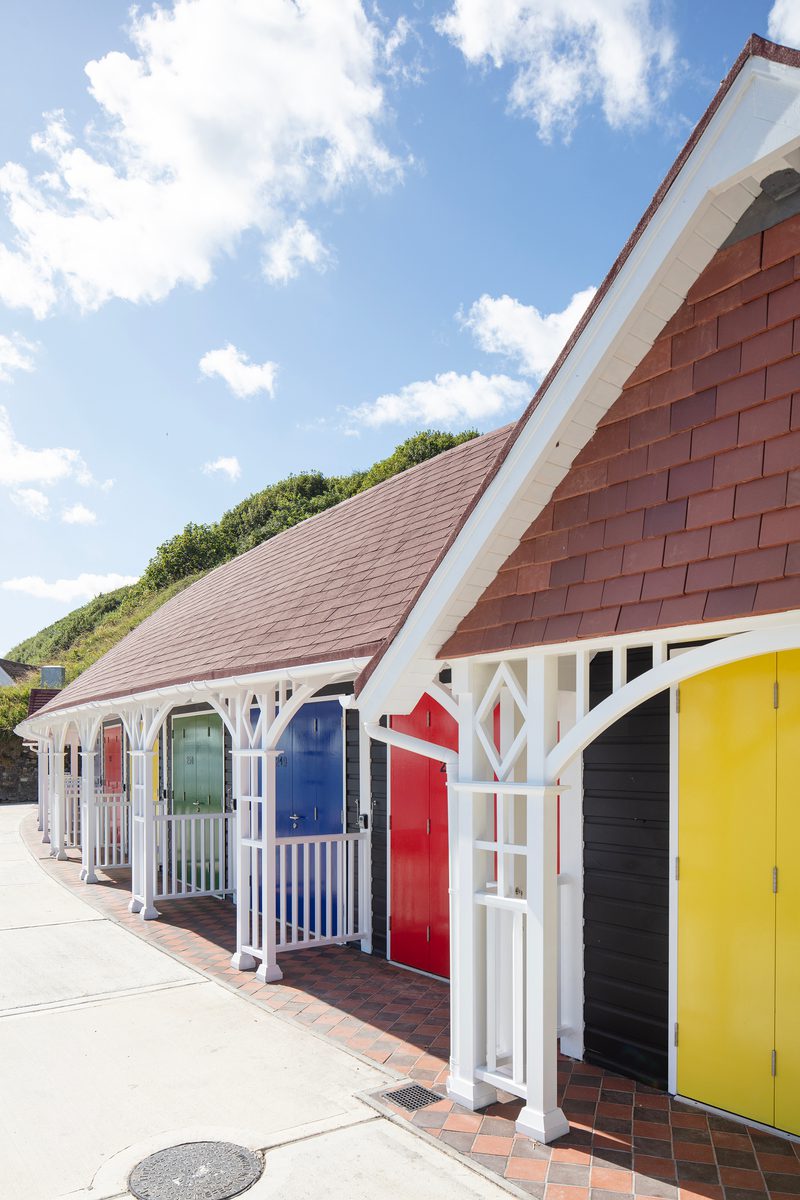 The colourful fronts of the rebuilt historic beach chalets on Scarborough's South Cliff.
