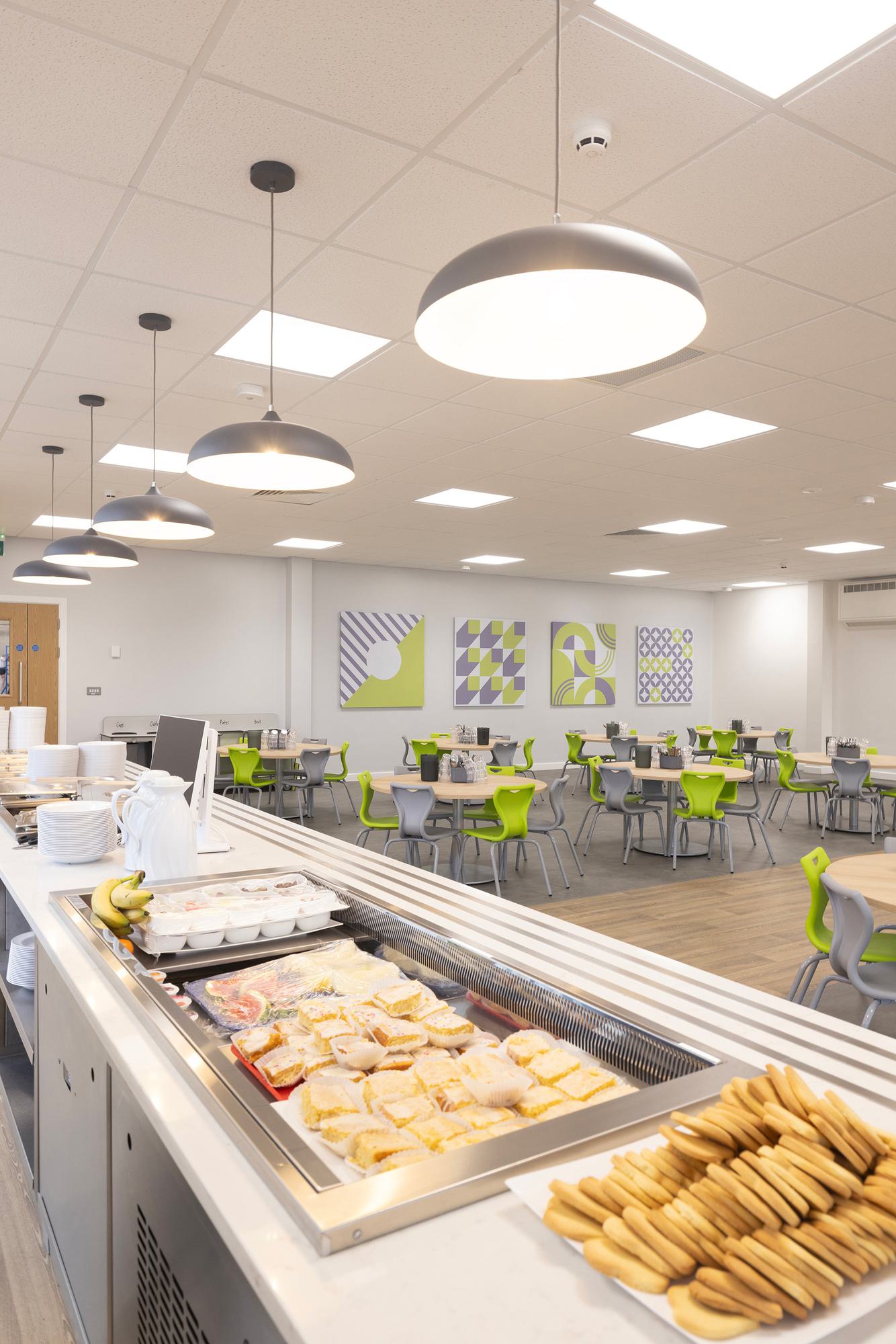 Bright lights above the food counter