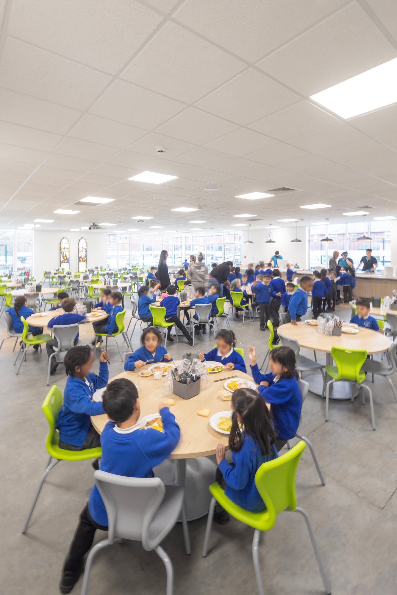 Colourful seating brightens the space