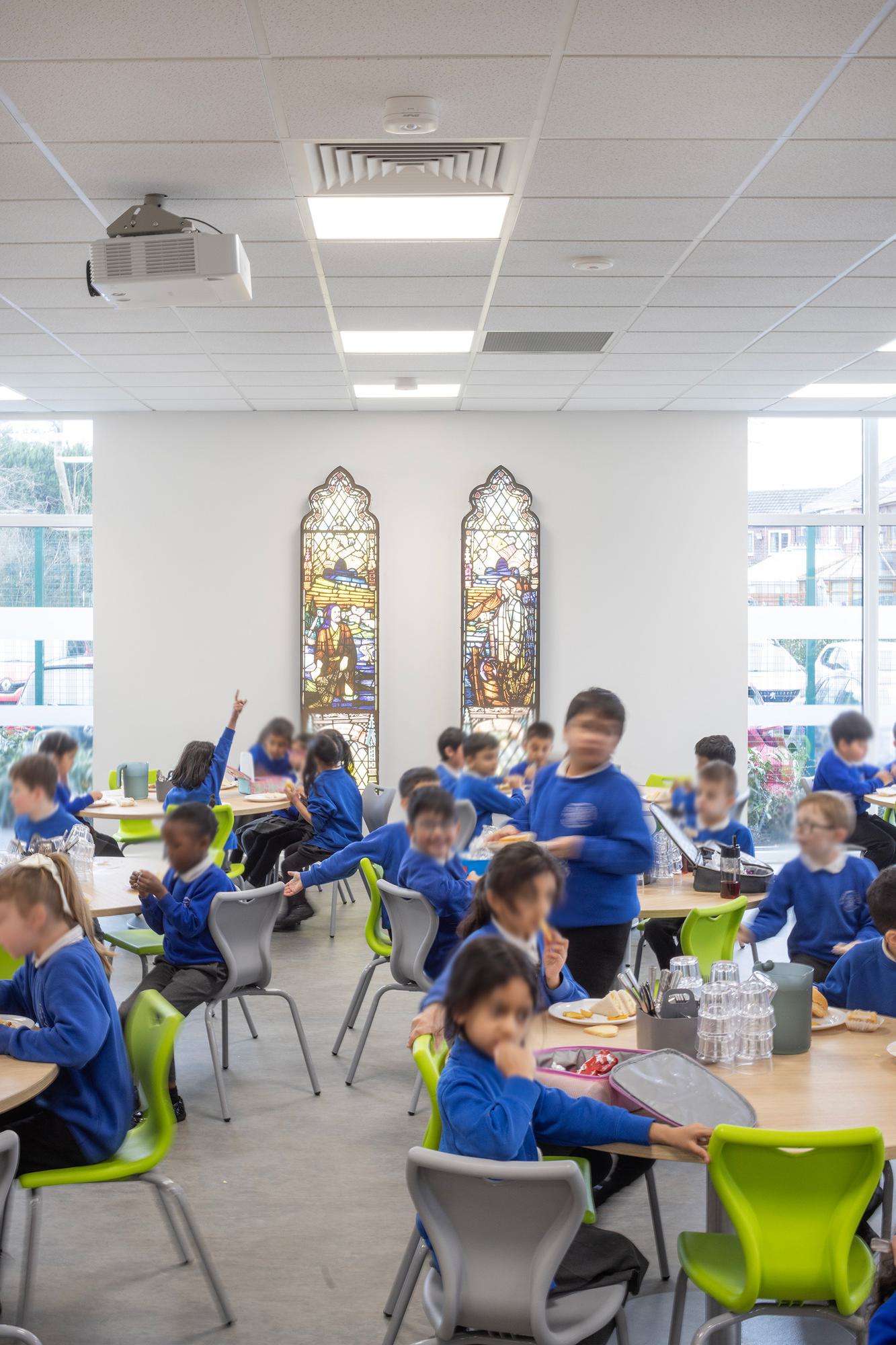 Replica stained glass adorns the walls