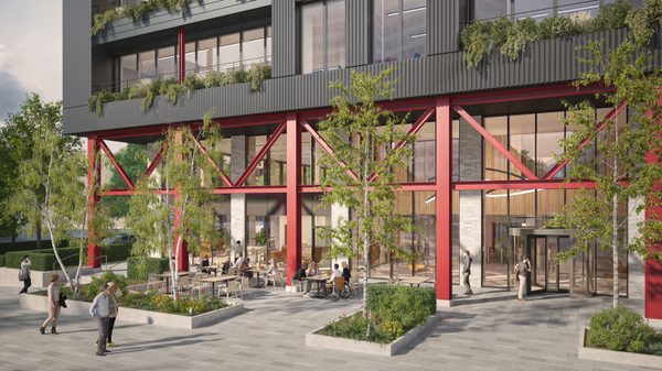 A visualisation of the ground floor entrance to the office building The Interchange with active public realm in the foreground.