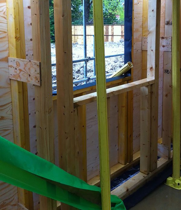 A construction shot, detailing the double stud prefabricated timber frame, used in the housing within the residential development at the Pheasantry.