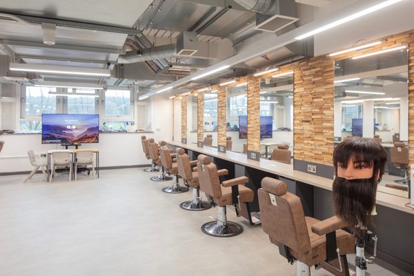 Inside the barbering space inside the Sheffield College's City Campus, with equipment for learning in the vocation.