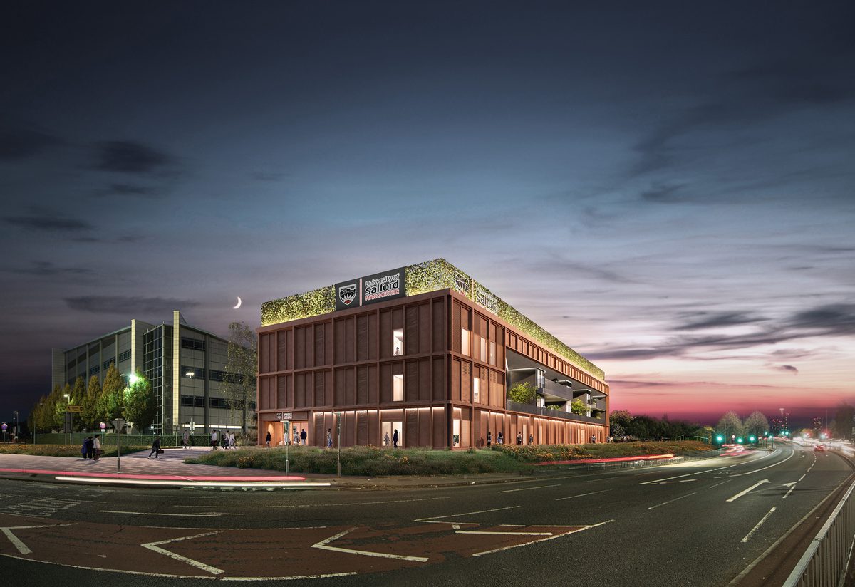 An exterior visualisation of the Thrive Health and Wellbeing Centre showing project's central location at night.