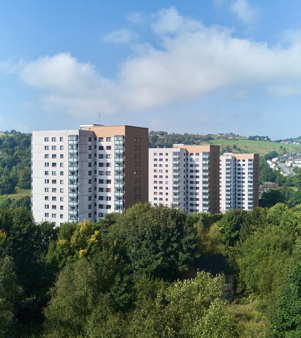 An aerial view of various high-rise residential buildings part of Together Housing Group.