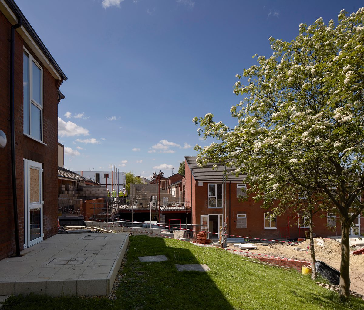 The exterior garden, with landscaped green areas, in one of the Independent Living Schemes in Vico Homes' property portfolio.
