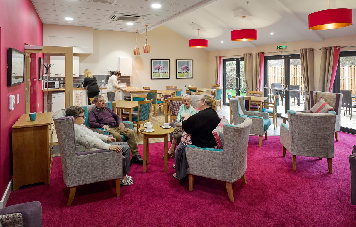 Residents enjoying the communal living space within one of the Independent Living Schemes in Vico Homes' property portfolio.