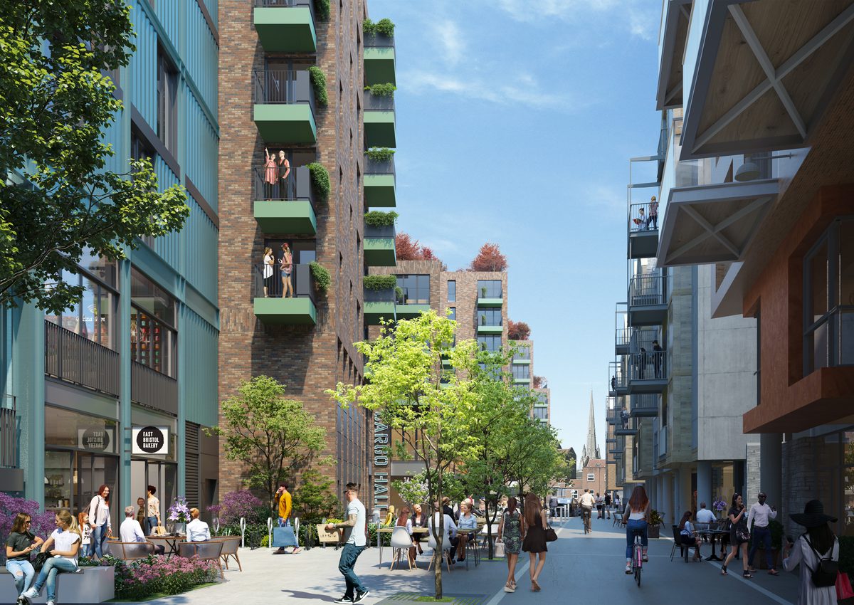 A visualisation of a street view with retail on either side of the Wapping Wharf development, with people enjoying a variety of spaces.