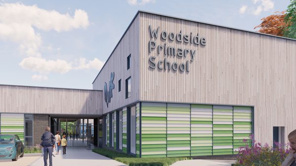 A visualisation of the entrance to Woodside Primary School showing its signage, green panels and people walking towards the school.